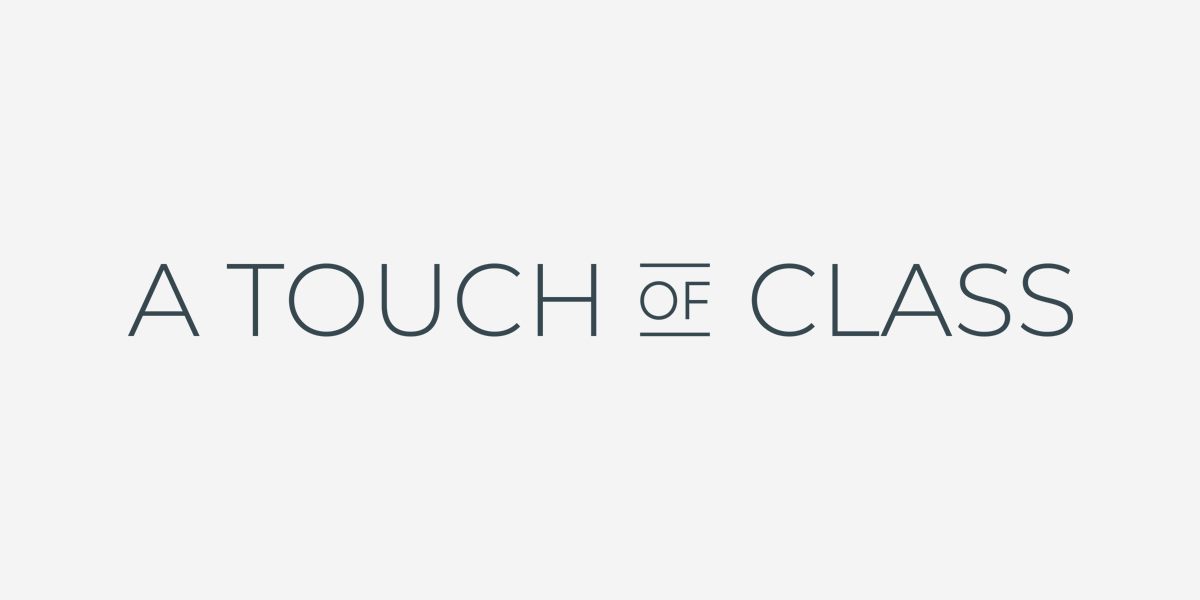 A Touch Of Class logo